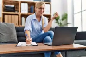online counsellor talking with client on computer